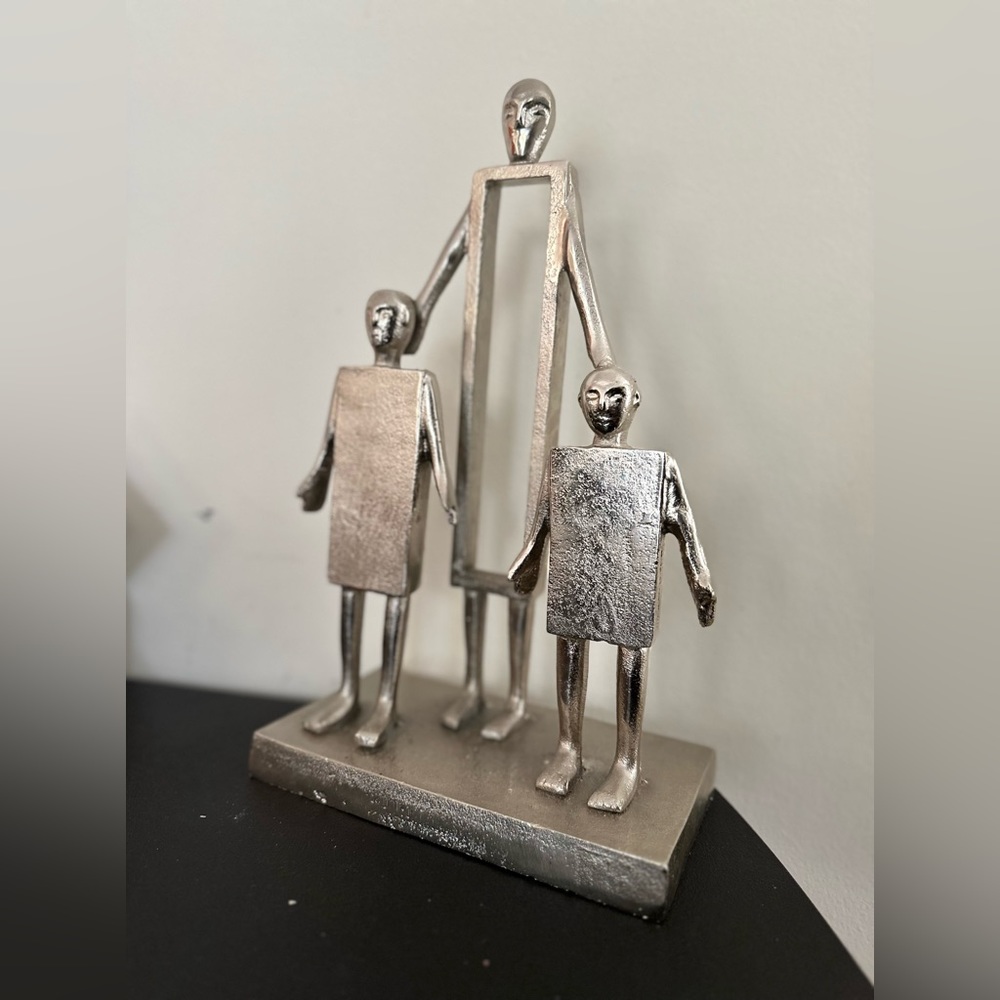 Father & Two Sons statue